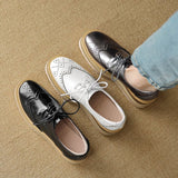 Derby-Schuhe mit Plateausohle im Brogue-Stil