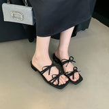 Sandalen mit Schleife