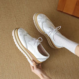 Derby-Schuhe mit Plateausohle im Brogue-Stil
