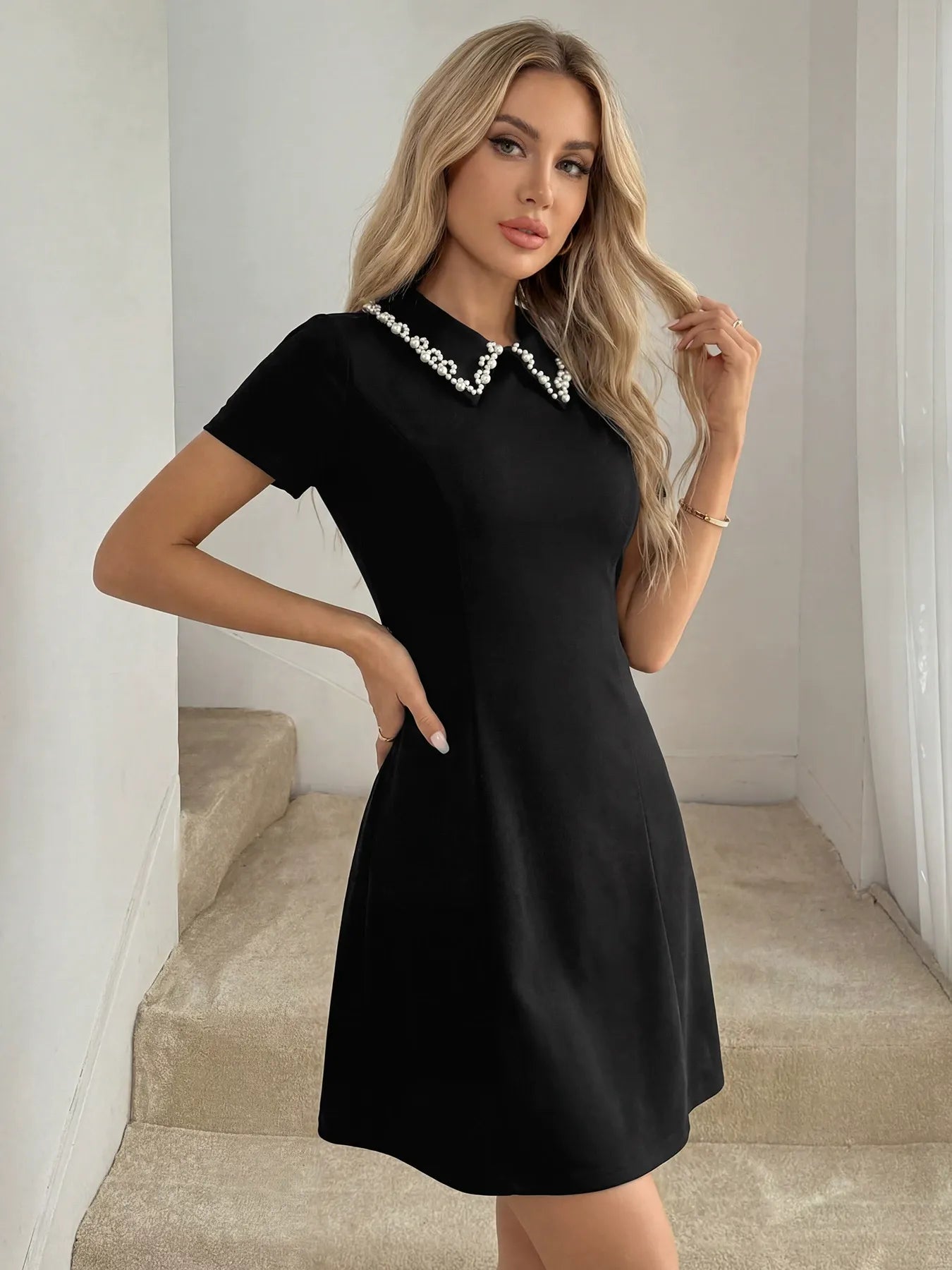 Classic Pearl-Detailed Black Mini Dress