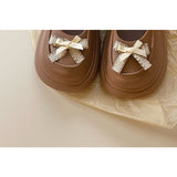 Mary-Jane-Clogs mit Plateausohle und Schleife