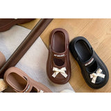 Mary-Jane-Clogs mit Plateausohle und Schleife