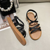 Plateau-Sandalen aus Kunstleder mit überkreuzten Riemen und Slingback