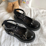 Mary-Jane-Schuhe mit Plateau-Keilabsatz und Sternschnalle