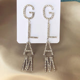 Novelty BOSS rhinestone letter earrings XG2104 Aosig